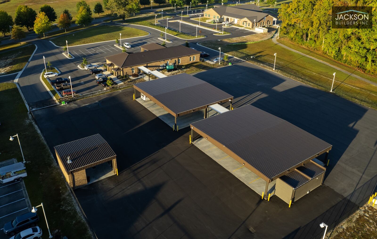 Long morning shadows across the campus's covered parking structures